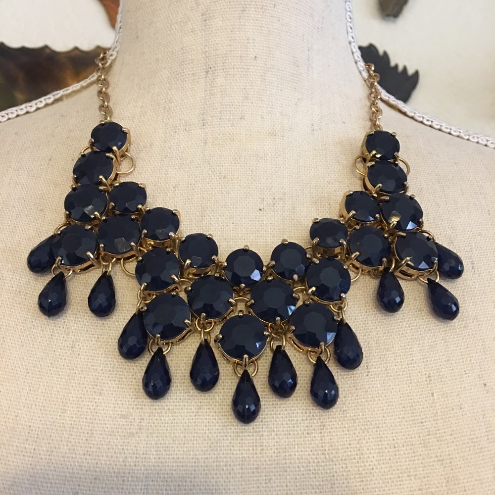 Faceted dark navy stone gold tone chain necklace